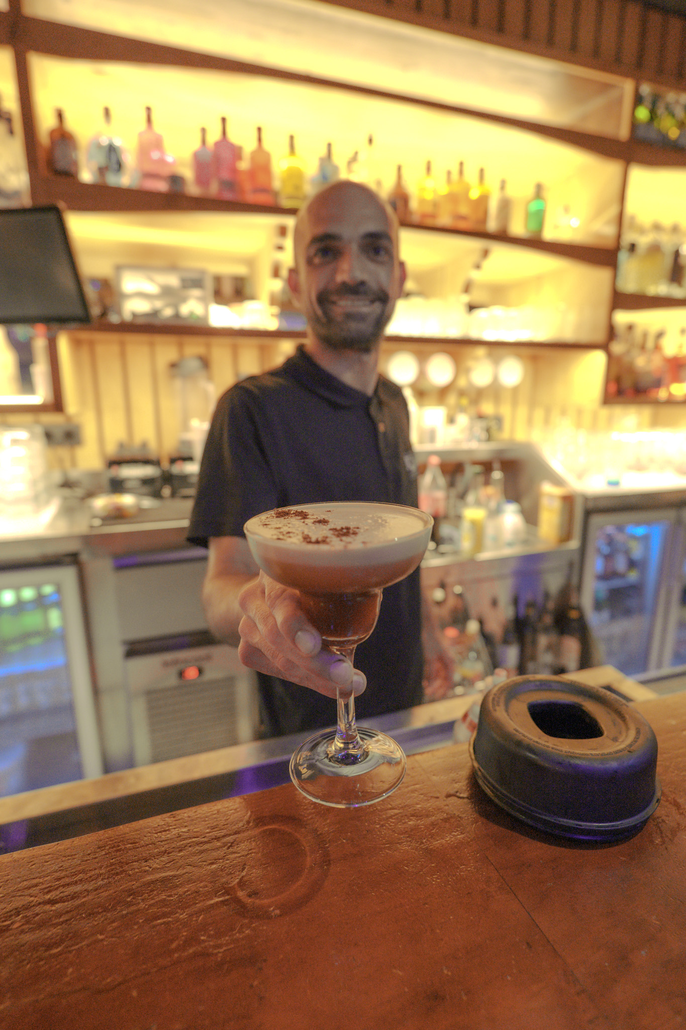 Bartender serving a cocktail at Kings Lanzarote